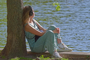 Girl listening music in headphones